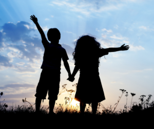 This world is all we have to leave to our children-photo of 2 children arms to the sky