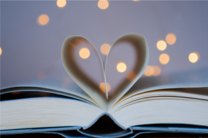 Heart between the pages of a book